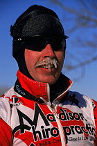 Cross country ski racer with frozen moustache and icicles, Wisconsin, USA