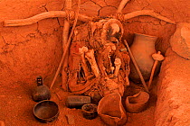 Skeleton and objects in burial site. San Pedro de Atacama, Chile