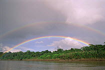 Rainbow over Madre de Dios River, Peru.