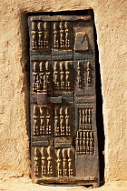 Dogon wooden door with sculptures, Mali, West Africa