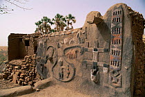 Dogon mural, relief carving on side of house, Mali, West Africa