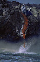 Lava from volcano falling into sea, Fernandina island, Galapagos