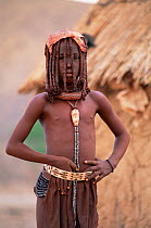 Himba girl, Kaokoland, Namibia, Hair tresses show adolescence 1999.