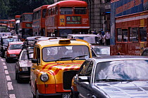 Buses, cars and taxis in traffic jam, Central London, UK.