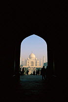 First view of the famous Taj Mahal through main gate arch, Agra, Uttar Pradesh, India
