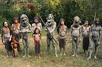 Asaro mud men, some wearing masks, Papua New Guinea 1991.