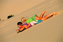 Sand toboganning Moreton Is, Queensland, Australia Liisa Widstrand