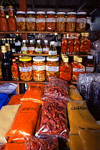Spices and preserves in market stall, Mahe, Seychelles, Indian Ocean