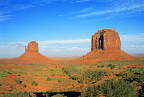 The famous view of East and West Mitten Buttes sandstone rock formations in Monument Valley, Utah, USA