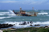 Waves breaking over shipwreck, Cape Angulus, South Africa