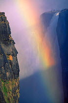 Victoria falls with rainbow in spray, Zimbabwe