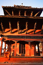 Holy man / Saddhu on steps of buddhist temple, Durbar Square, Kathmandu, Nepal