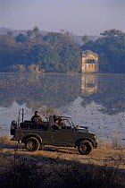 Valmik Thapar (with beard) and Fateh Singh in jeep at Rajbagh, Ranthambhore NP, Rajasthan, India (Television presenter and previous head of park and Project Tiger)