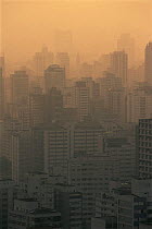 Sao Paulo city in evening smog, one of the world's most populated and hence polluted cities, Brazil, South America