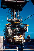 Johnson Sealink II submersible being lowered into the sea - one of the few craft in the world capable of reaching depths of 1,000 metres. Filming for BBC tv series Blue Planet about life in the oceans