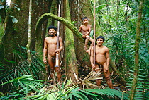 Huaorani indians in rainforest with blowpipes for hunting, Yasuni NP, Ecuador, South America