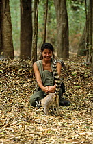 Presenter Charlotte Uhlenbroek with Ring tailed lemur {Lemur catta}, filming on location in Madagascar for BBC television series "Cousins", 1999