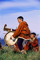 Native Koryak man dancing with drum, Ossora, Karaginsky, Kamchatka Peninsula, Russia