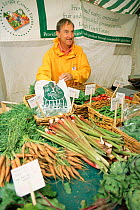 Carrots and Rhubarb for sale in Farmers Market, Bristol, UK.