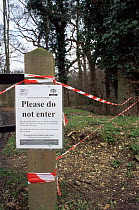 Sign prohibits entry to Ashtead common, Surrey, during Foot and Mouth disease outbreak. June 2001