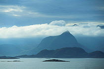 View to Vestvagoy Island in clouds, Lofot Islands, Norway, Europe
