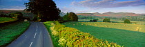 Panoramic view of country road and countryside near Llanfrynach, Wales, UK