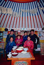 Mongolian family in traditional ger, Hangay mountains,  Mongolia 1992