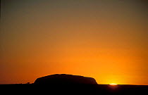 Silhouette of Ayer's Rock (Uluru) at dawn, Northern Territories, Australia