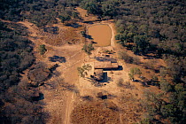 Aerial view of settler's outpost with surrounding area overgrazed by cattle and goats. Dry Chaco, Argentina. almost 80% of Dry Chaco is affected by overgrazing altering its structure and species compo...