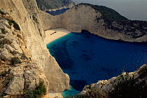 Looking down onto deserted secluded beach and cove, Zakynthos, Greece