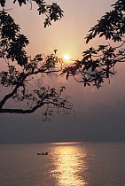 Evening sun over fishing canoe, Lake Kivu Kivu region, Virunga NP, Democratic Republic of Congo, formerly Zaire