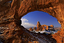 Turret Arch as seen through Window Arch in winter, Arches National Park, Utah, USA