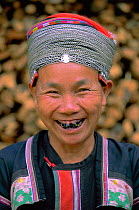 Yuayao Dai ethnic woman portrait, Xishuangbanna, Yunnan Province, China, in winter dress
