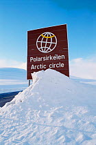 Road sign indicating position  of Arctic Circle, Norway