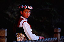 Naxi woman (ethnic minority) in traditional costume Lijiang town, Yunnan, China