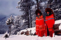 Red panda fur hats worn by Yi people (ethnic minority) in winter. Lijiang, Yunnan, China 2001