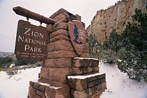 Entrance sign to Zion National Park in winter, Utah, USA