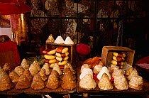 Yak butter and cheese for sale at market,  Zhongdian (Tibetan area) Yunnan, China