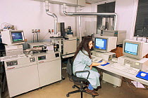 Chemist analyzing Nuclear Magnetic Resonance for environment contaminants, USA