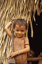 Arara Indian boy outside hut home, Xingu River, Amazon Basin, Brazil, South America, 1994