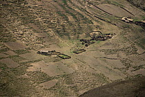 Aerial view of Quechua settlement and fields in Andes, Bolivia, South America