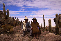 Aymara couple living on Inkawasi Island, Uyuni Salt Pan, SW Bolivia, South America