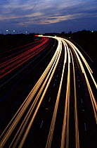 Car lights from M4 motorway at night, near Bristol, UK
