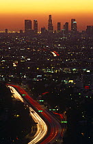 Los Angeles at dawn with sun rising through smog. California, USA, 2000