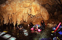 Divers surface in Chanderlier cave, Palau, Micronesia