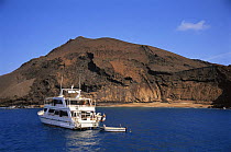 Boat moored offshore at Tower Island, Galapagos Islands, South America