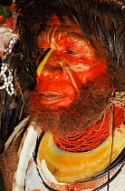 Close up of painted face of Huli wigman, Central Highlands, Papua New Guinea