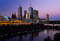 Melbourne City skyline at dusk from Southgate, Victoria, Australia