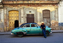 1950s American car and local man, Havana, Cuba Caribbean