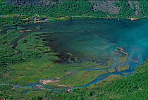 Aerial view of river delta and tourist lodge. Gjende, Jotunheimen NP, Norway